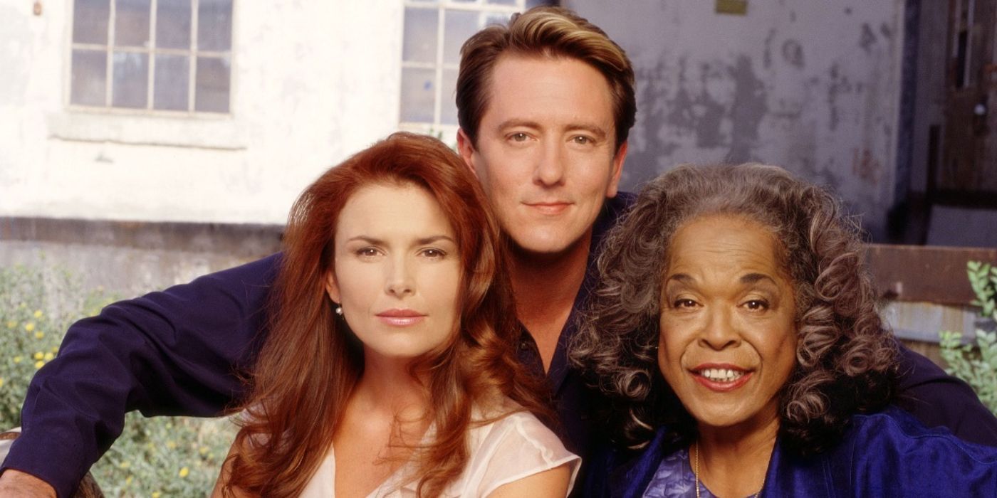 The cast of Touched by an Angel pose together and smile.