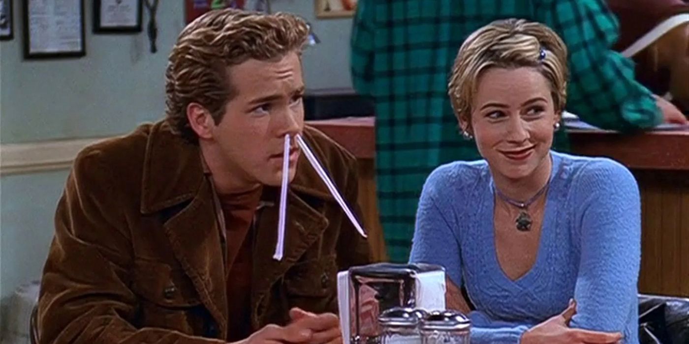 Ryan Reynolds with two straws up his nostrils sitting with a young woman at a restaurant in Two Girls, A Girl and a Pizza Place.
