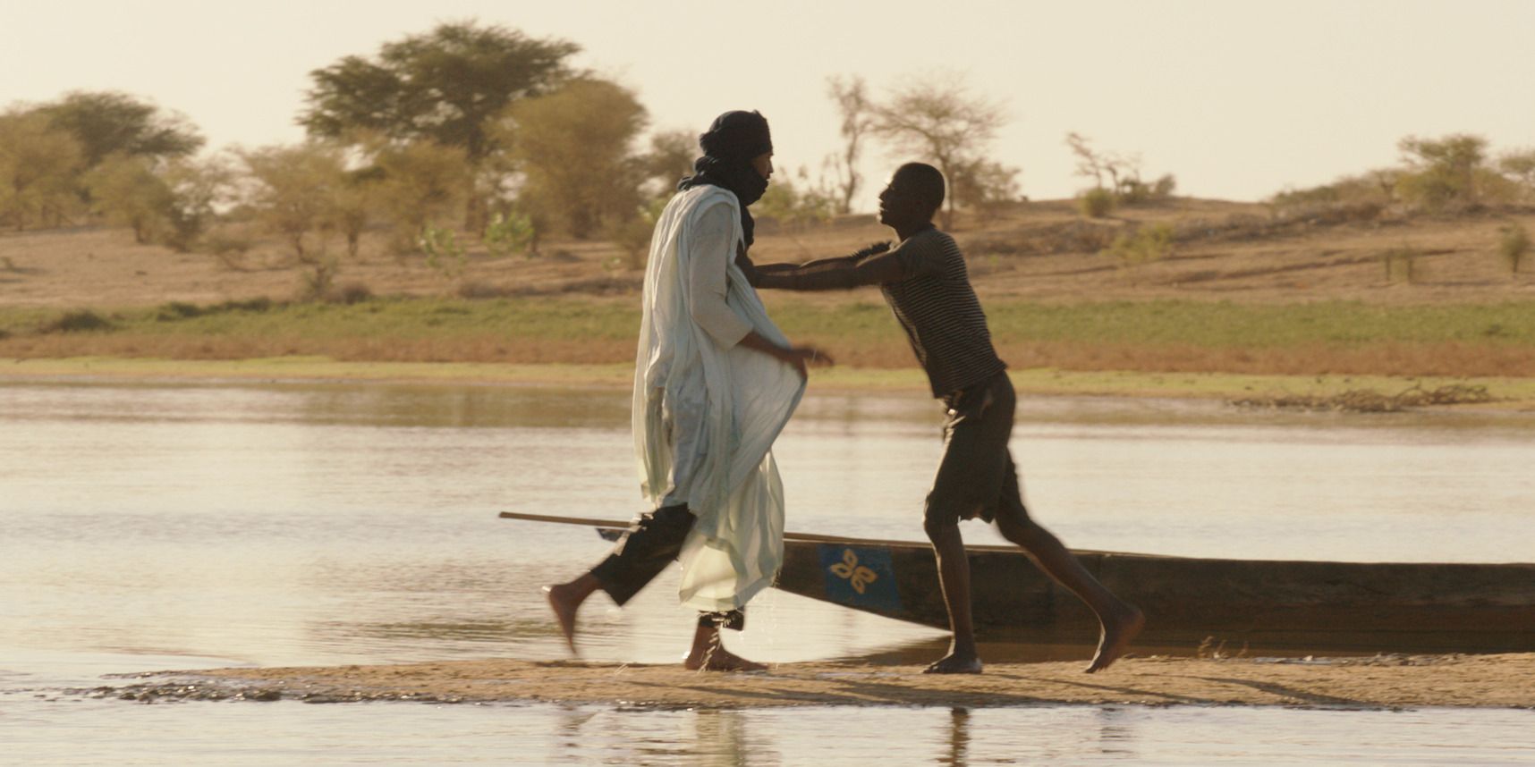 Two men fighting by a river in &lsquo;Timbuktu&rsquo;
