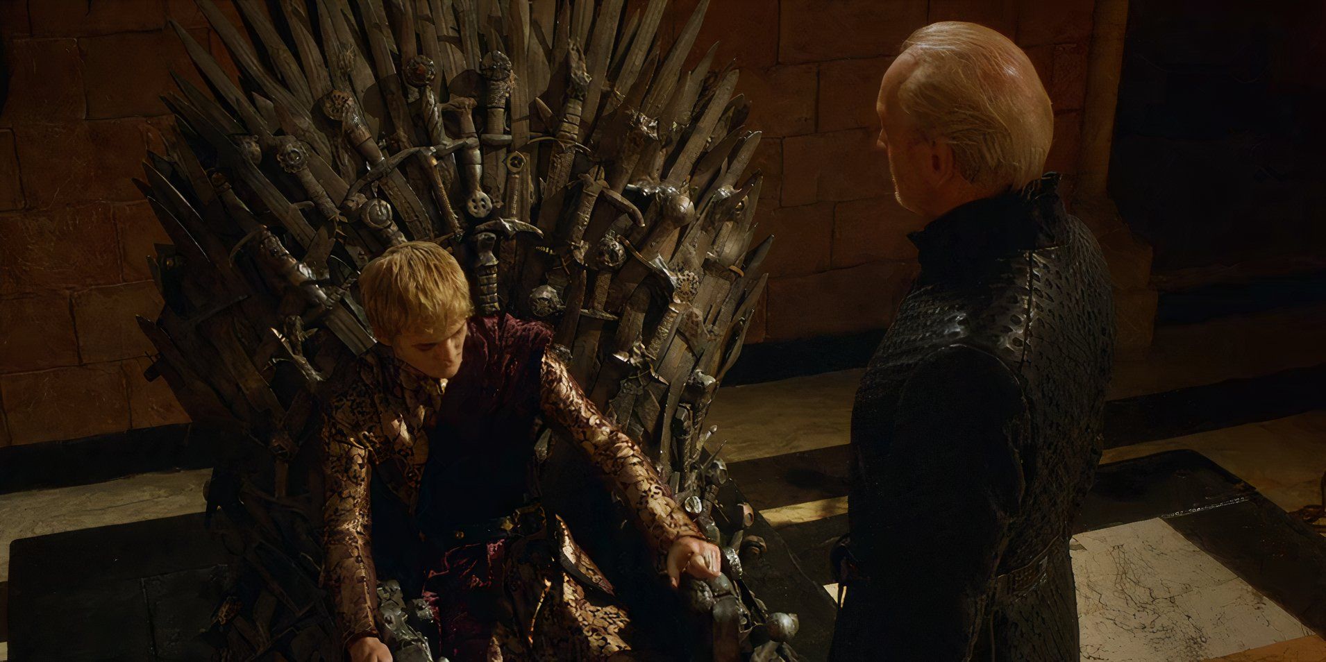 Tywin speaks to Joffrey while Joffrey sits on his throne looking small in Game of Thrones Season 3 Episode 7