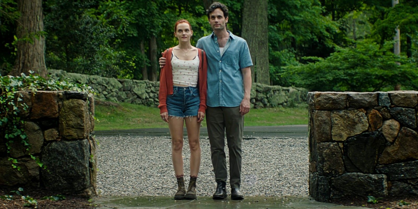 Embargoed until 4/24 - major spoilers for You Season 5 - Bronte Flannery and Joe Goldberg standing at a house in the countryside together