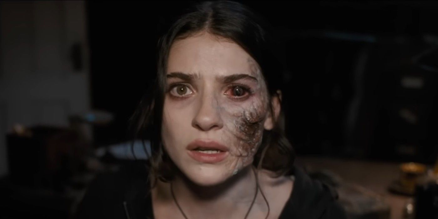 Ella Rubin as Clover with black veins taking over one side of her face and one eye in Until Dawn.