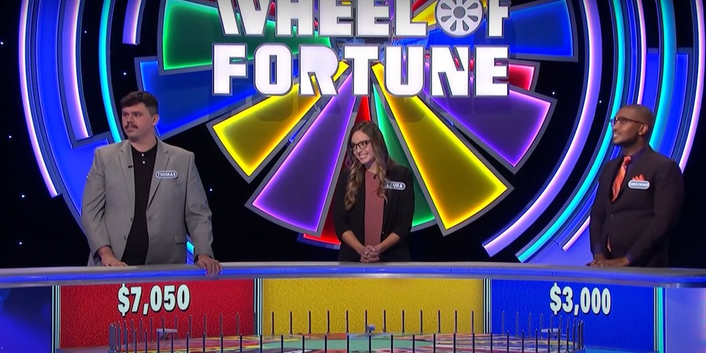 Three contestants, Thomas Lipscomb, Christopher Coleman and Laura Machado on Wheel of Fortune