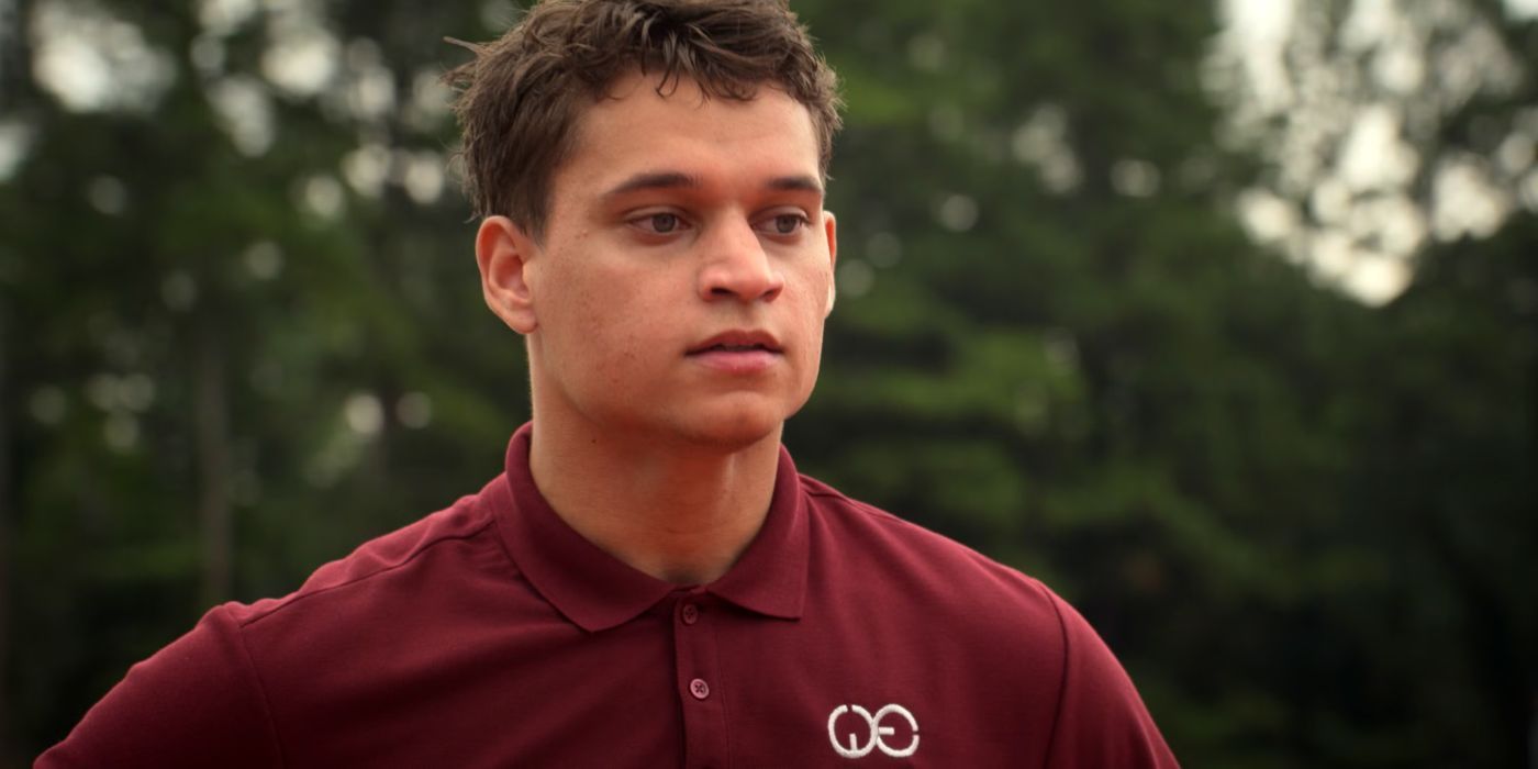 tyriq withers wears a maroon polo shirt
