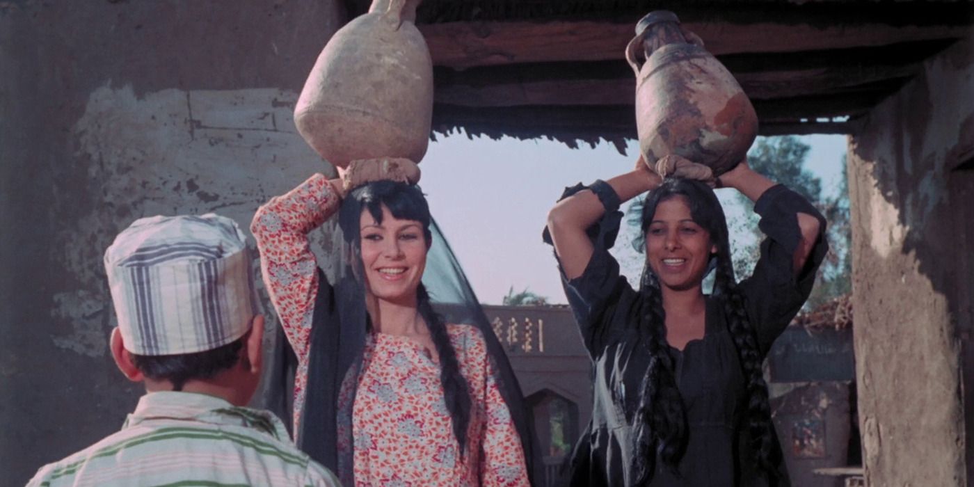 Women carrying vases in &lsquo;The Land&rsquo; (1969)