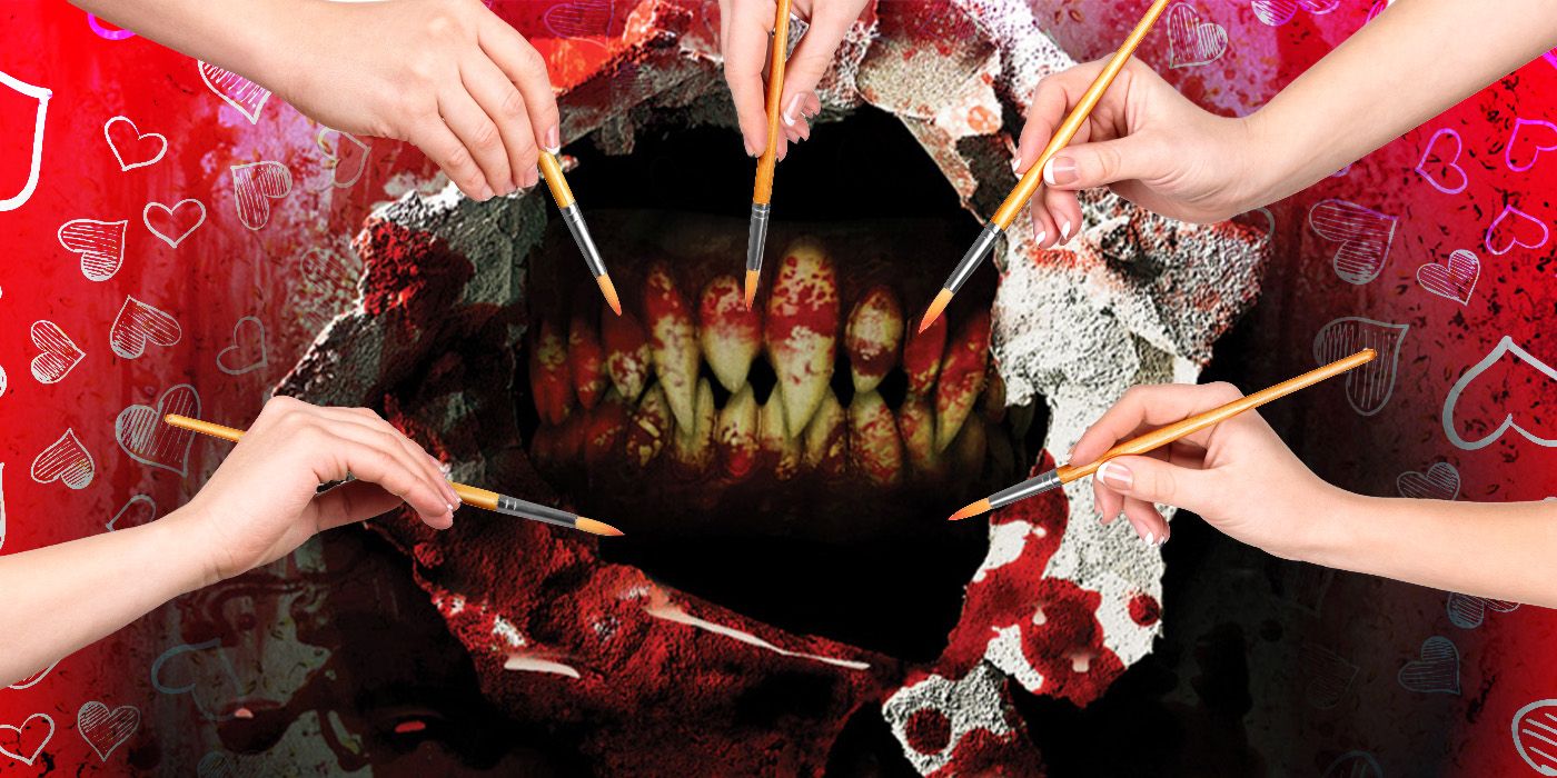 A bloody set of teeth is seen through torn heart-patterned paper, while five hands holding paintbrushes pose around it.