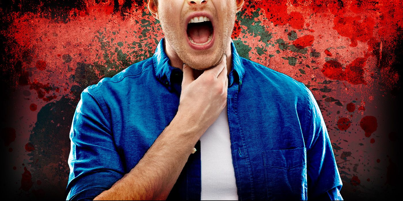 A man in a blue shirt clutching his throat and opening his mouth wide against a blood-spattered backdrop.