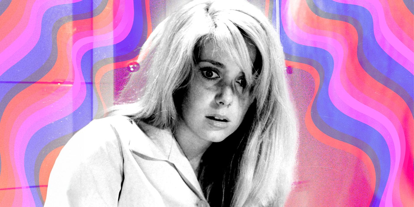 Catherine Deneuve as Carole, looking startled in front of a psychedelic pink background in Repulsion.