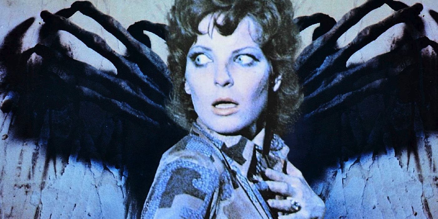Betty, played by actor Lone Fleming, looks behind her in shock, with a pair of black, winglike hands spreading out behind her in Tombs of the Blind Dead.