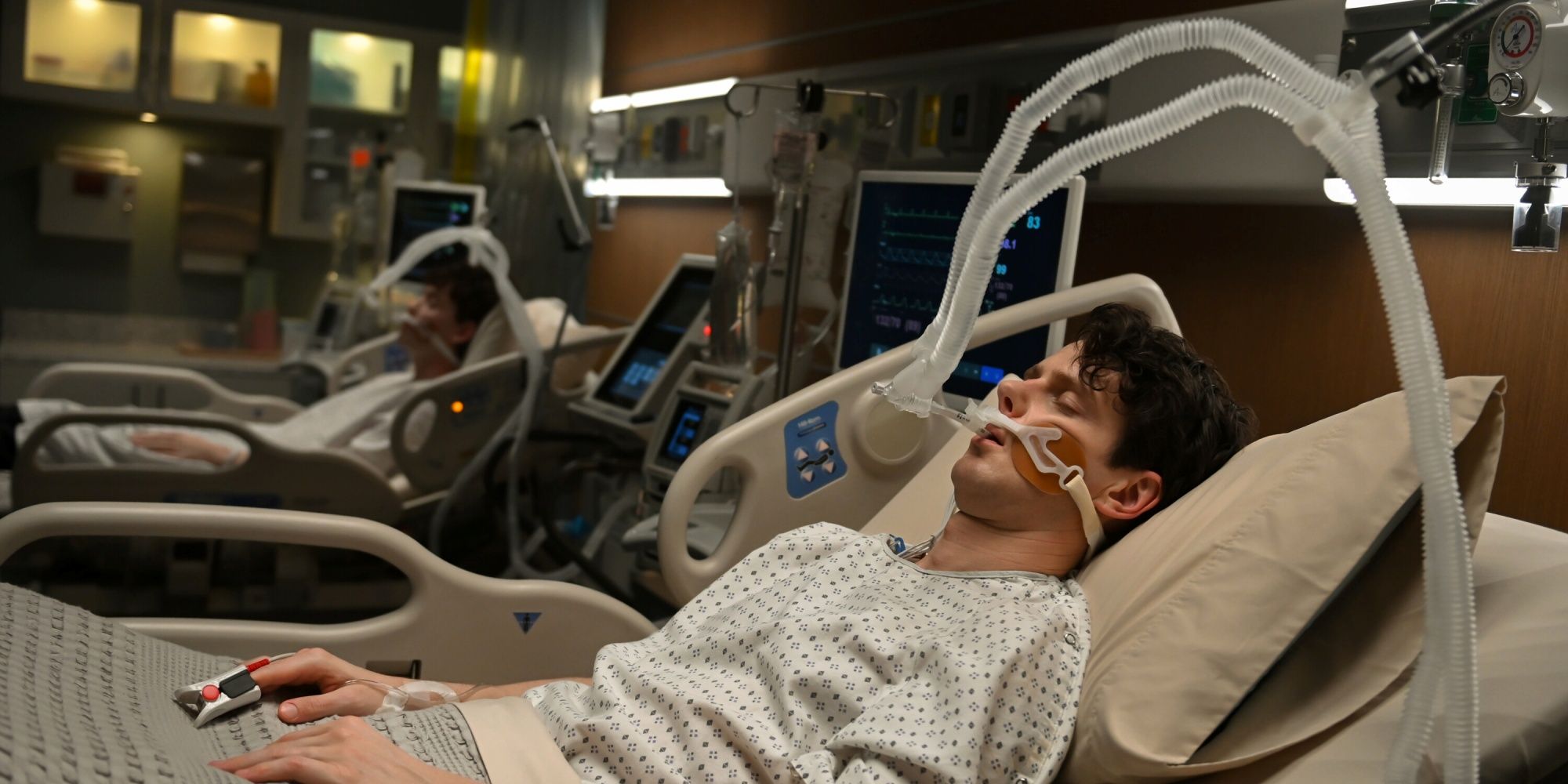 Peter Mark Kendall as twins Adam and Stephens in separate hospital beds in the CBS series Watson
