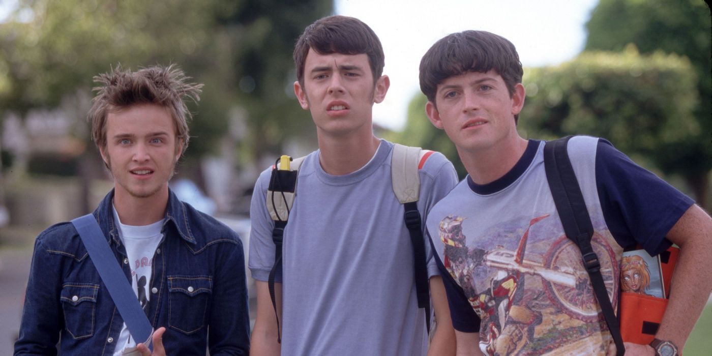 Aaron Paul, Colin Hanks, and Manu Intiraymi as Floyd, Cosmo, and Dunleavy outside looking at something in Whatever it Takes.