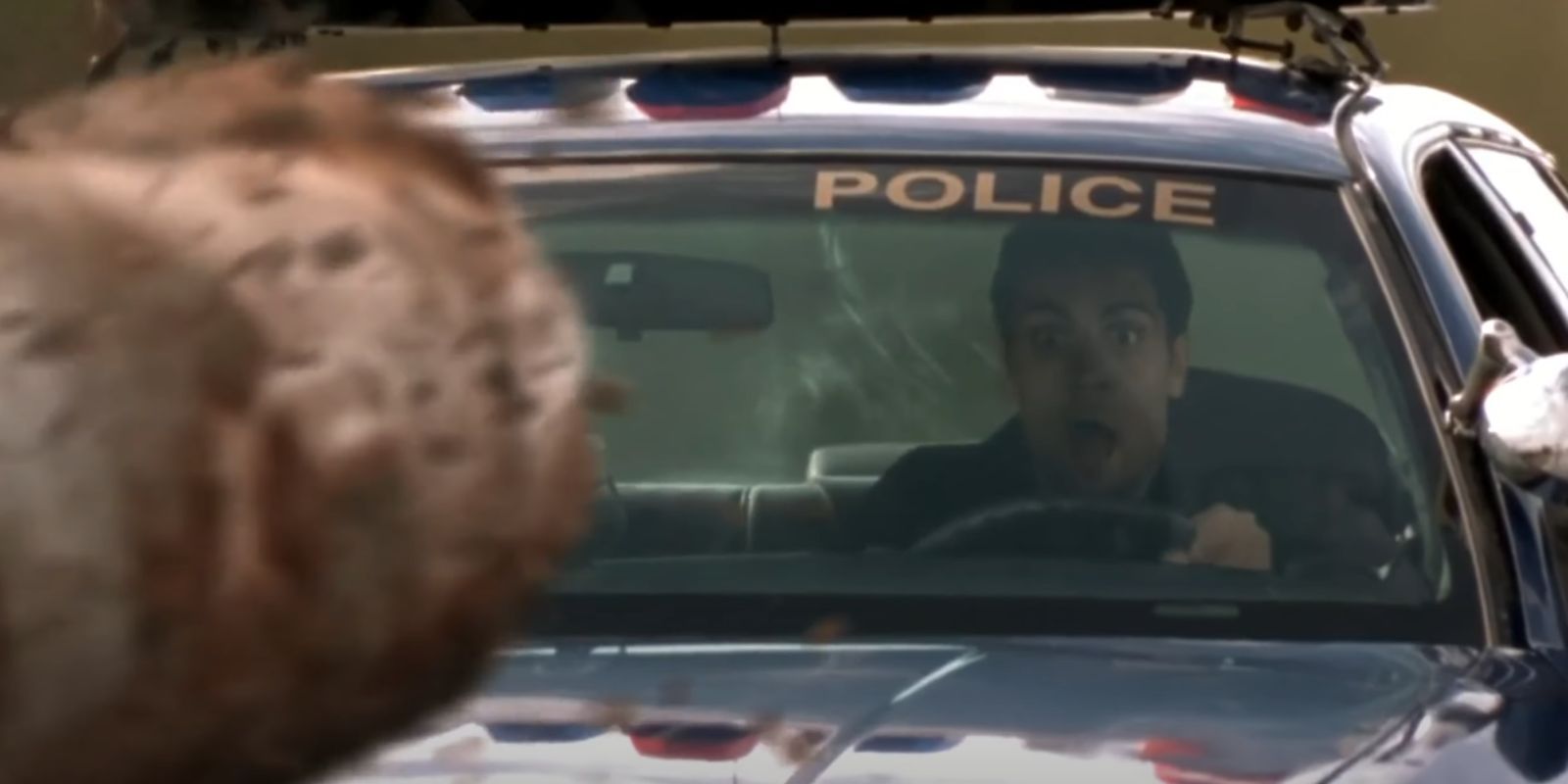 A log hurtles towards the driver of a police car in Final Destination 2.