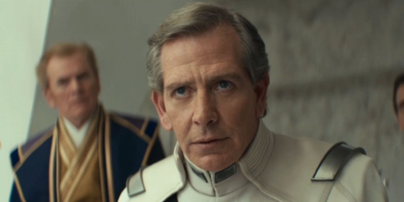 Krennic (Ben Mendelsohn) prevents himself in a clothing uniform in Andor Season 2