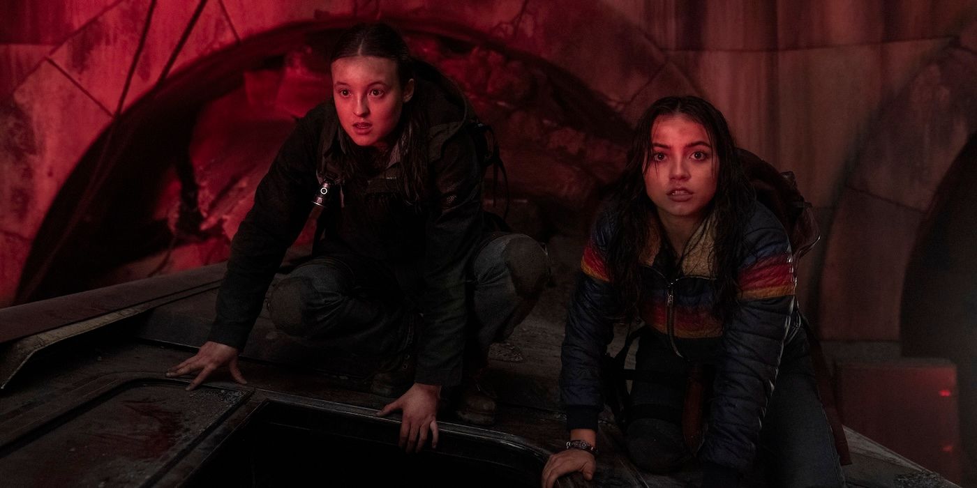 Bella Ramsey as Ellie and Isabela Merced as Dina in the subway in The Last of Us Season 2 Episode 4