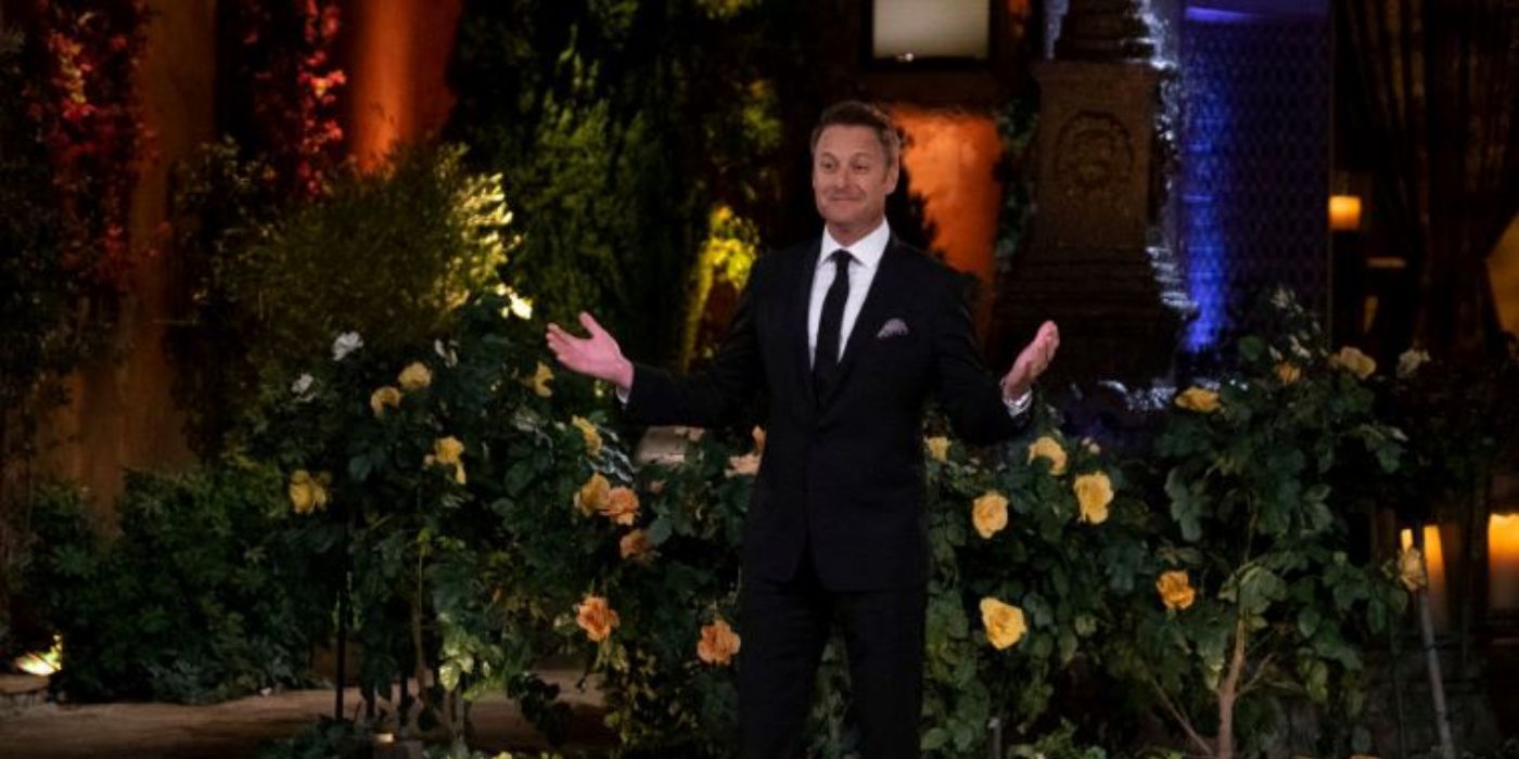 Chris Harrison stands in front of the iconic Bachelor mansion.