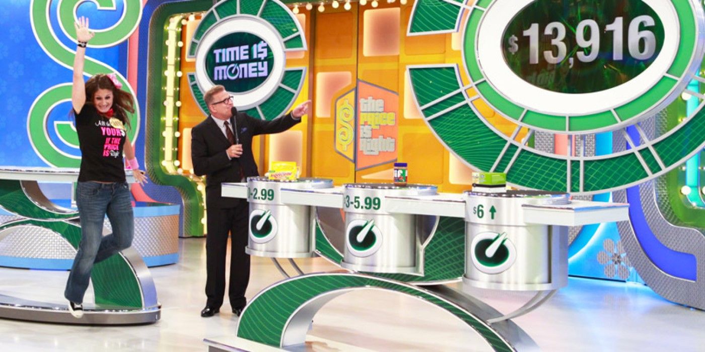 Contestant jumps for joy after winning $13,916 playing Time is Money on The Price is Right.