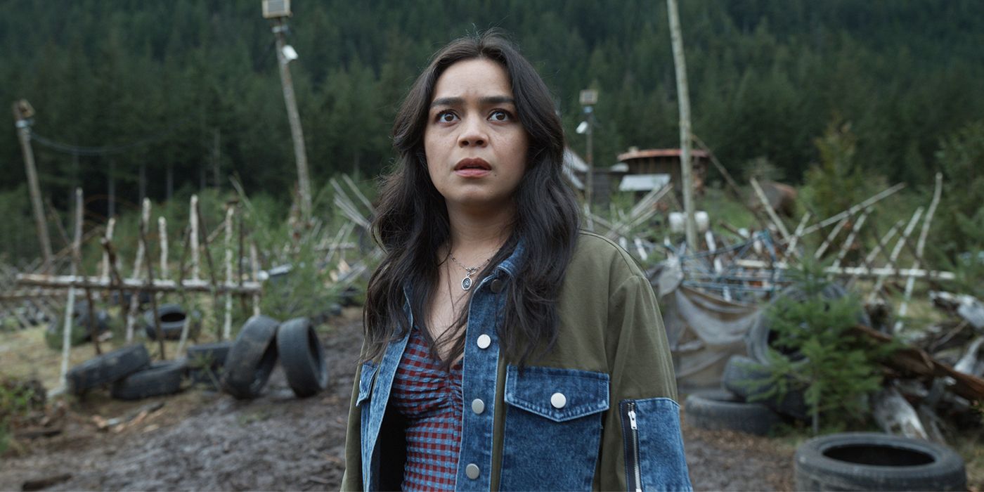Kaitlyn Santa Juana as Stefani, standing fearfully on the grounds of Iris' apocalyptic safehouse in Final Destination Bloodlines
