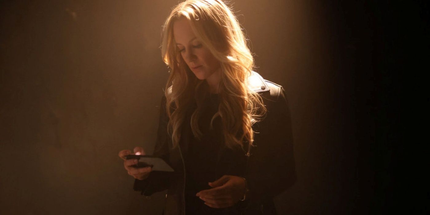 Danielle Savre as Lena, Sir's sister, looking down at her phone, in Season 2 of the NBC series Found