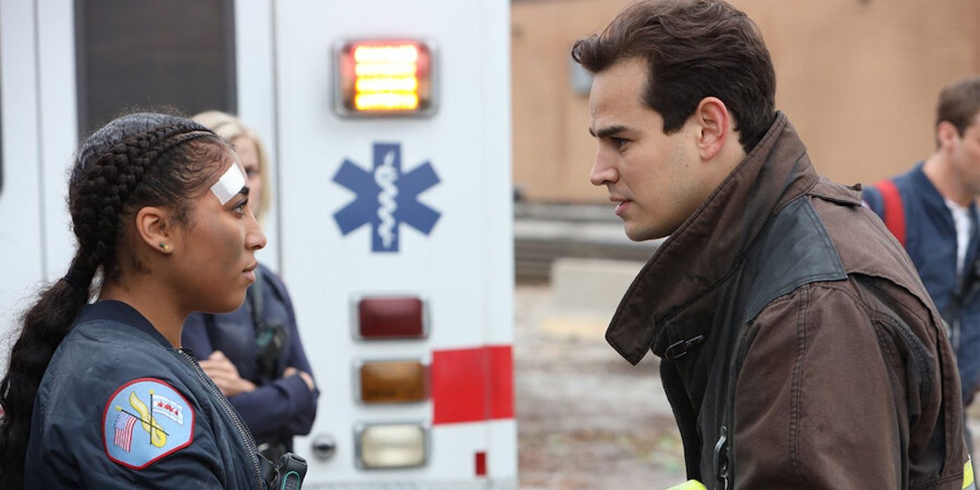 Gianna Mackey (Adriyan Rae) and Blake Gallo (Alberto Rosende) talking on scene in Chicago Fire.