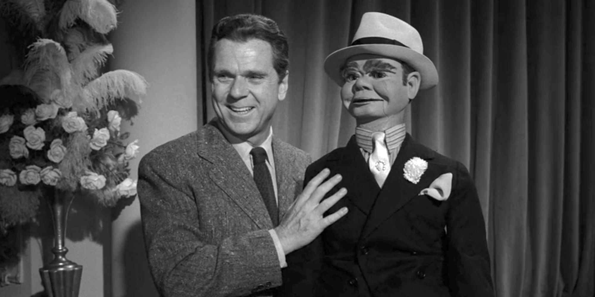 Jackie Cooper holding a ventriloquist dummy in The Twilight Zone episode Caesar and Me
