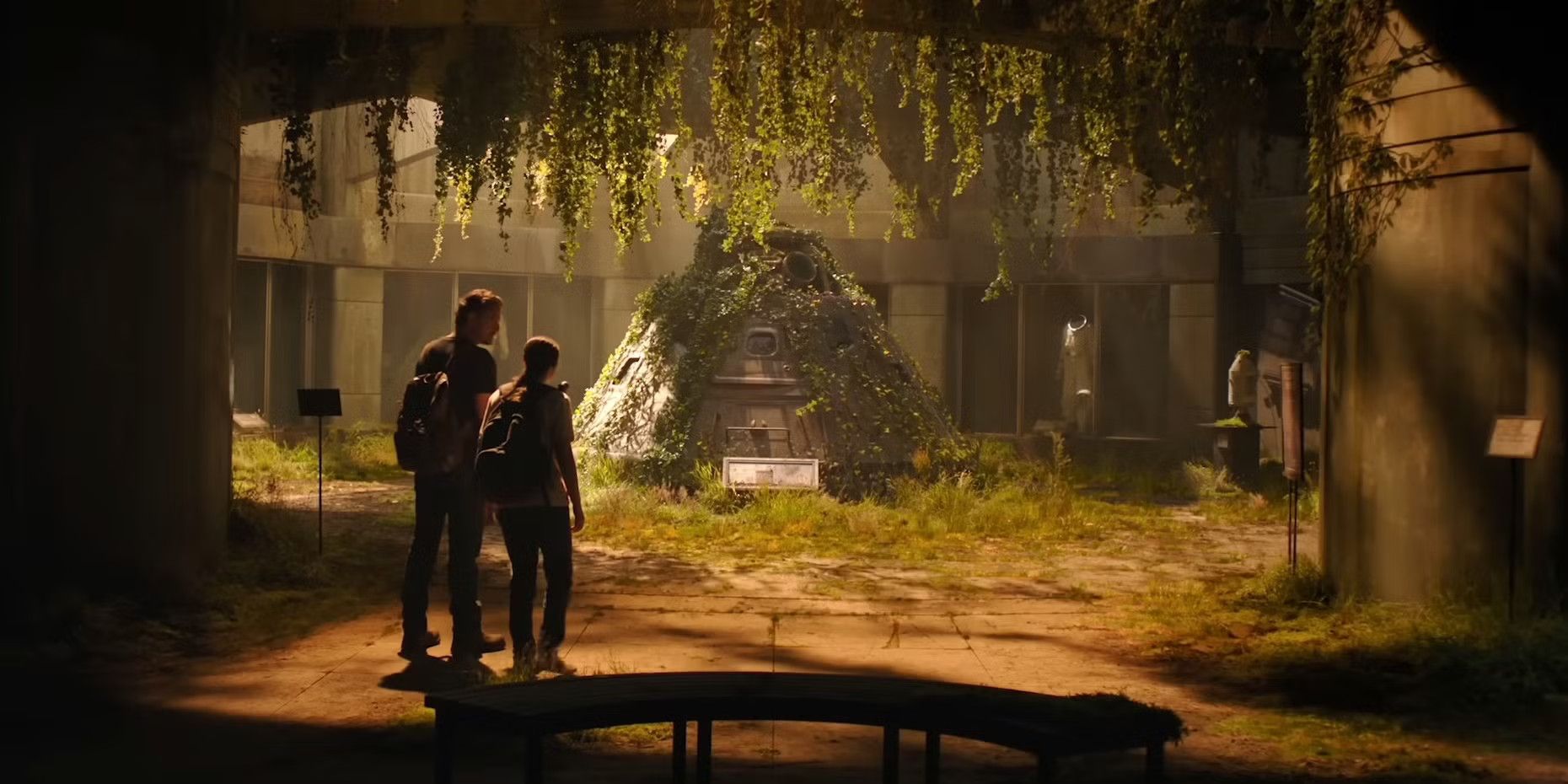 Joel and Ellie walk through an abandoned aerospace museum in The Last of Us Season 2.