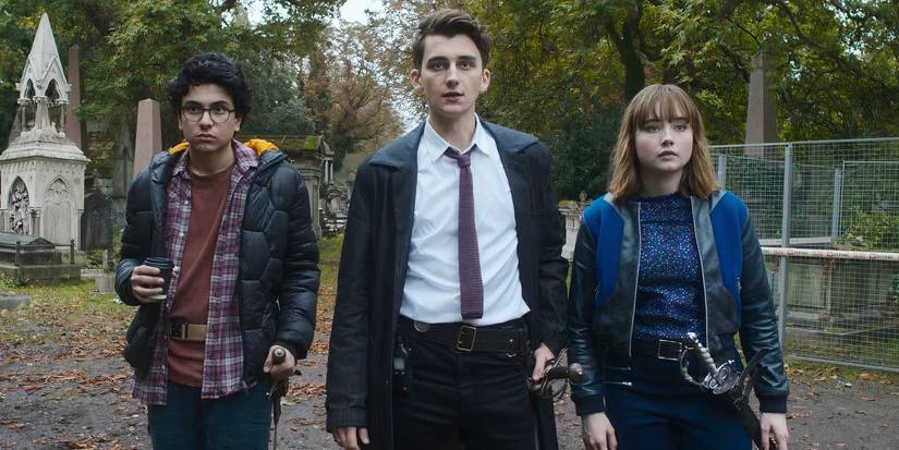 Lockwood & Co's three protagonists (Ruby Stokes, Cameron Chapman, Ali Hadji-Heshmati) stopping short and staring ahead.