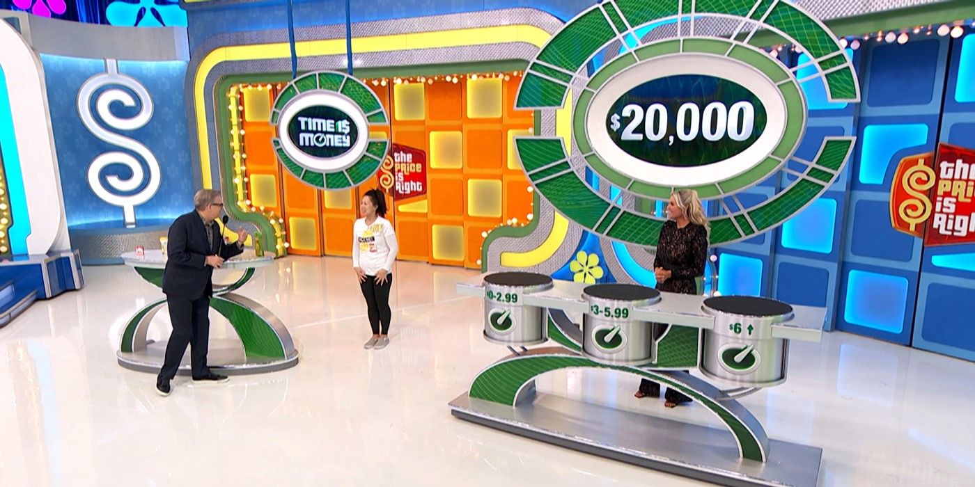 Lucy joins Drew Carey on stage to play Time is Money on The Price is Right.