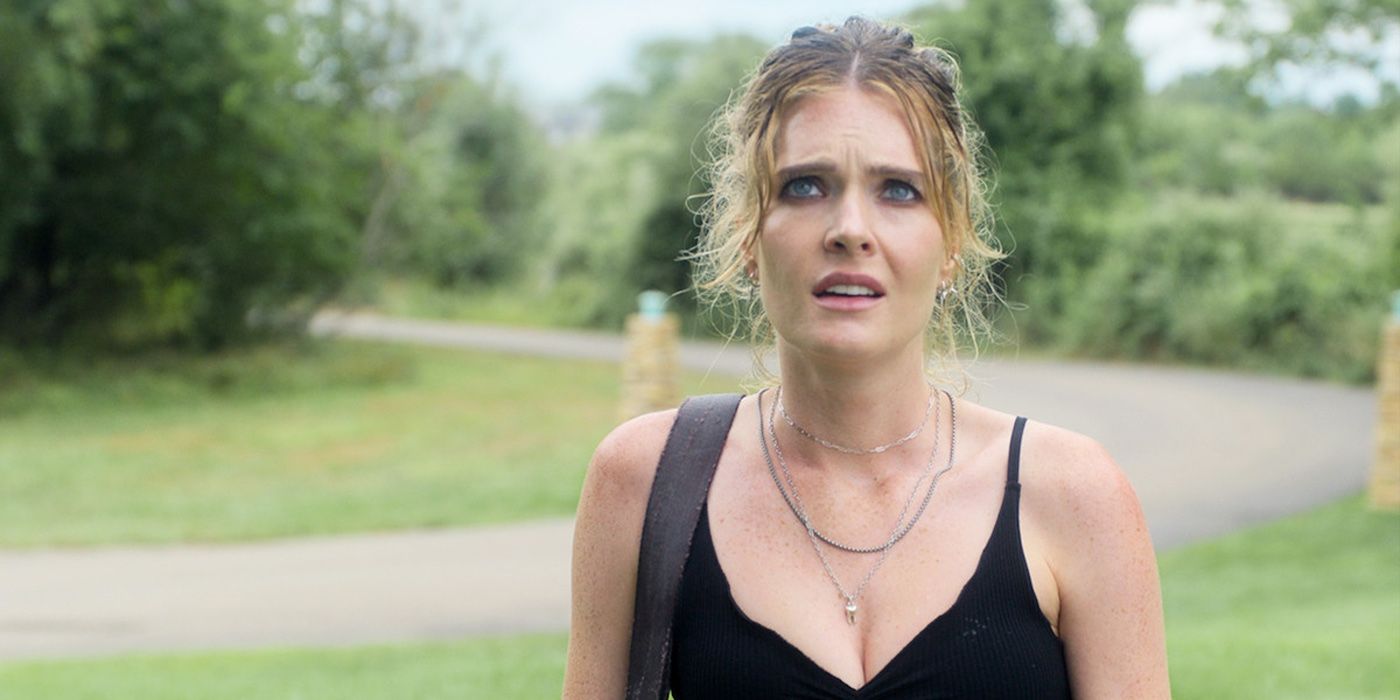 Meghann Fahy wearing a black tank top and looking disheveled in Sirens