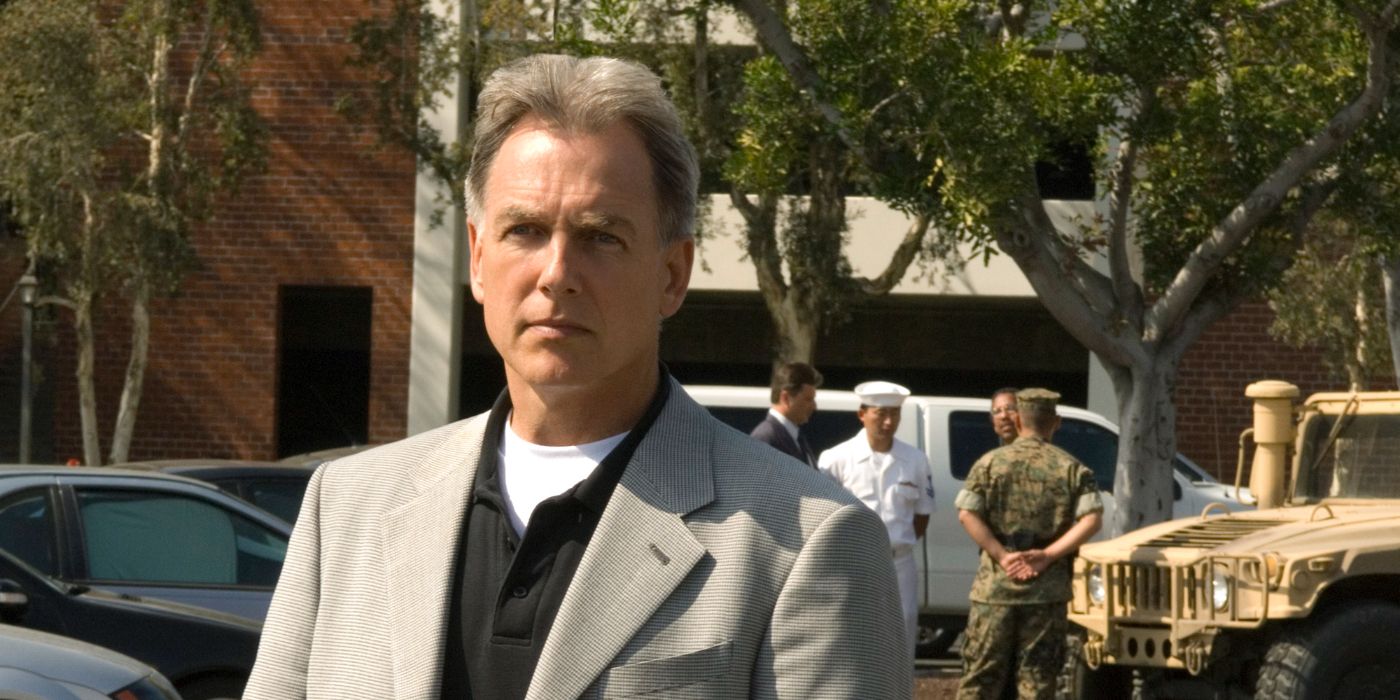 Mark Harmon as Leroy Jethro Gibbs with a military truck behind him in NCIS.