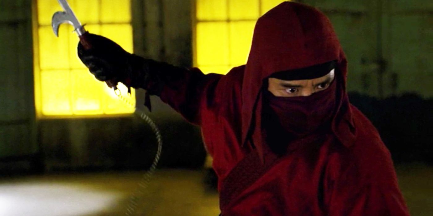 Peter Shinkoda as Nobu Yoshioka, a high-ranking member of The Hand in all red holds a weapon in Daredevil.