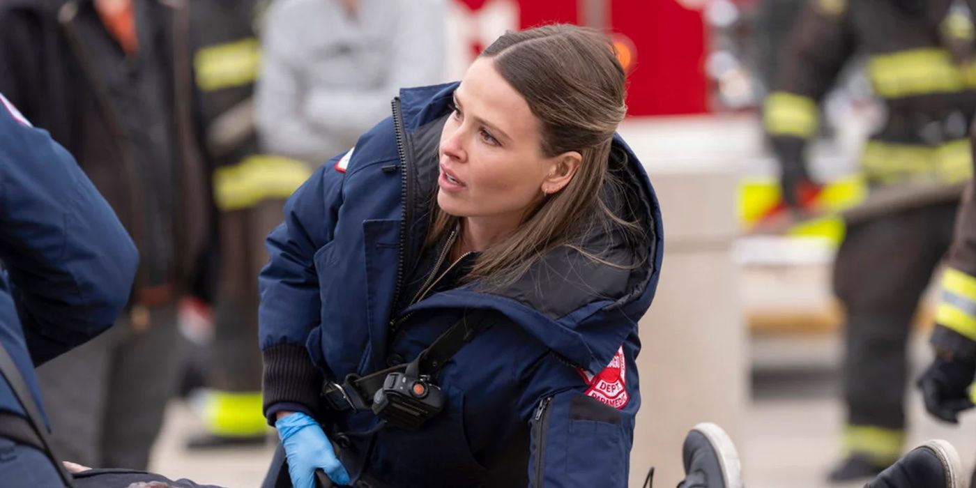 Novak (Jocelyn Hudon) assesses a patient on the scene in Chicago Fire episode "The Bad Guy."