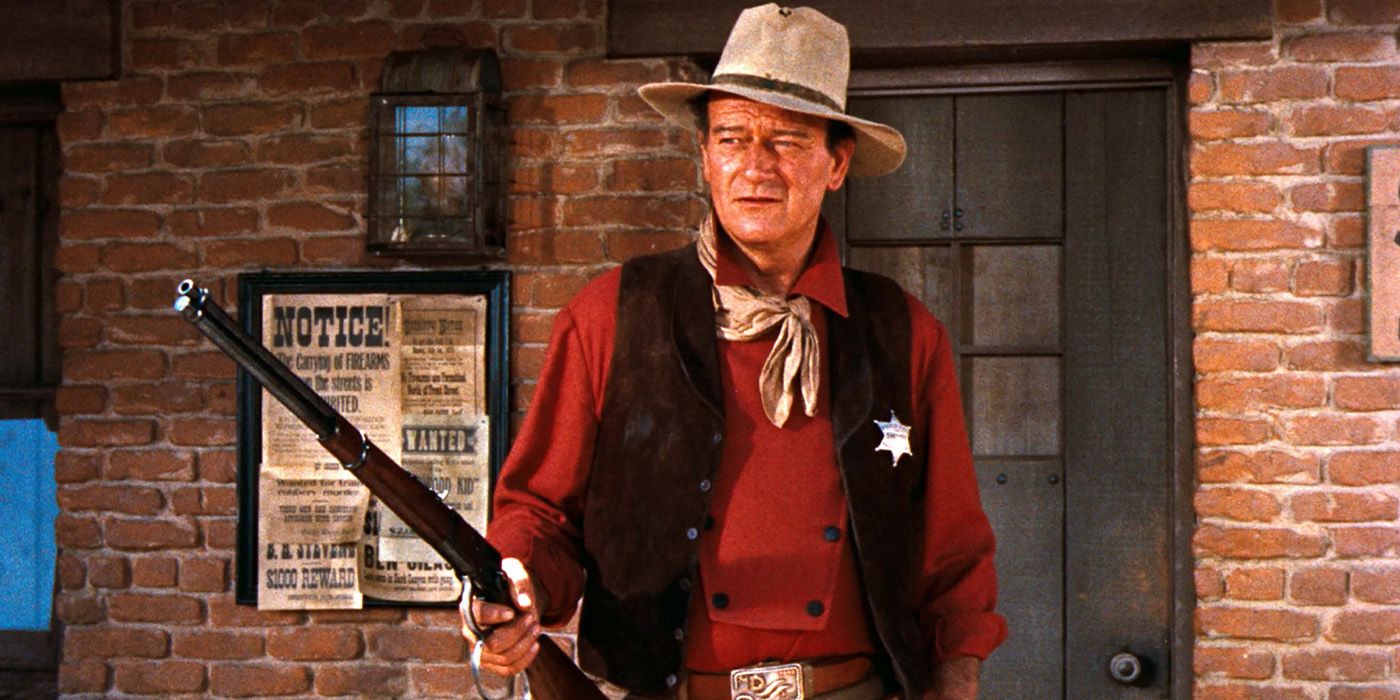 Džons Veins kā Džons T. Šaute ar savu šauteni 'Rio Bravo'.