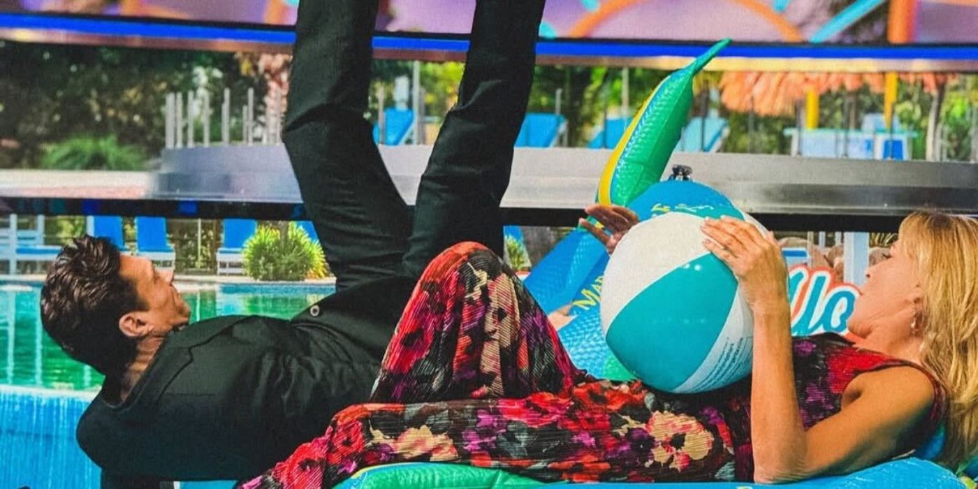 Ryan Seacrest falls when sitting on a pool float on Wheel of Fortune 