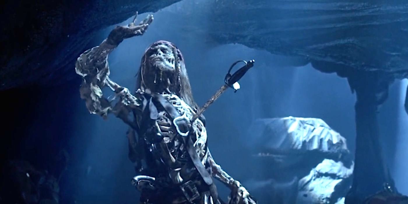 Captain Jack Sparrow (Johnny Depp) turns into a skeleton from cursed gold in Pirates of the Caribbean: The Curse of the Black Pearl (2003).