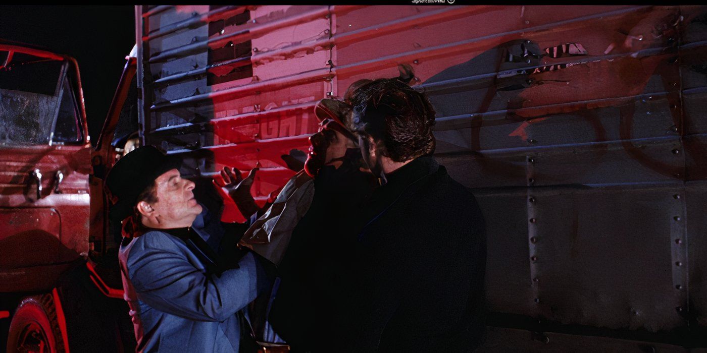 Joe Pesci and Robert De Niro as Tommy and Jimmy hijacking a truck driver in Goodfellas.