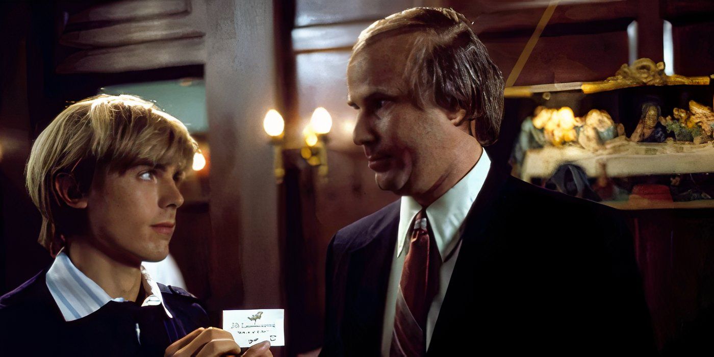 Will Ferrell as Cubby the funeral director accepting a business card from someone in Drowning Mona.