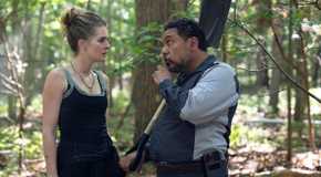 Felix Solis shushing Meghan Fahy in the forest in Sirens