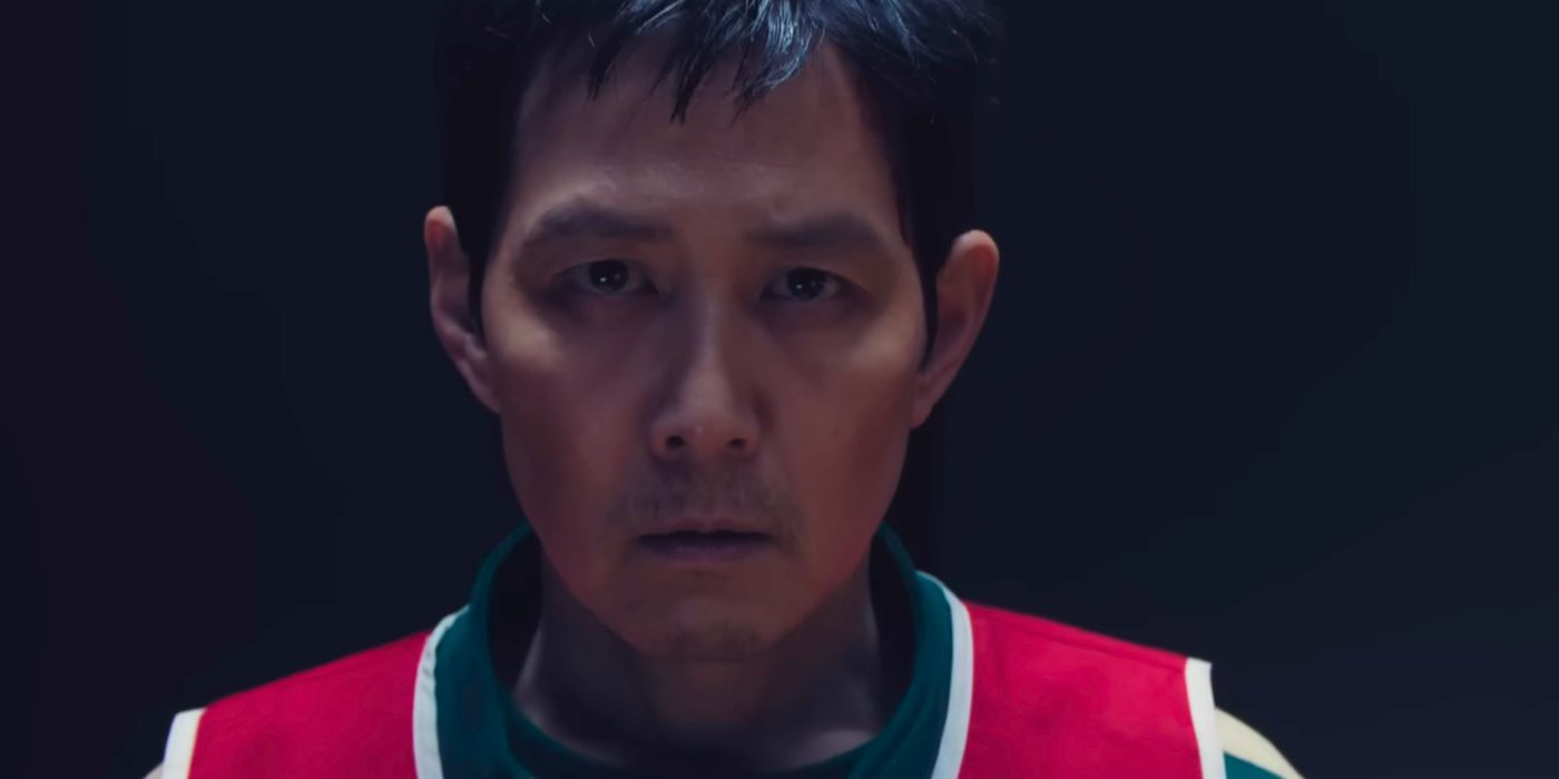 Gihun is near tears and wearing a red vest in the Squid Game 3 trailer