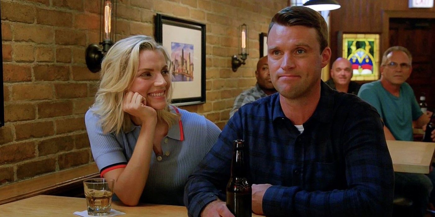 Sylvie Brett (Kara Killmer) and Matt Casey (Jesse Soffer) sharing a table and having drinks at Molly's in Chicago Fire.