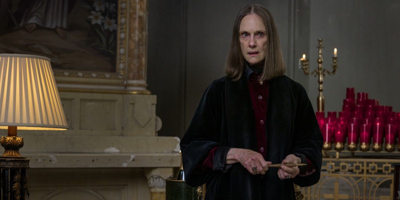 The Dama (Lisa Emery) stands in a church in 'The Walking Dead: Dead City'