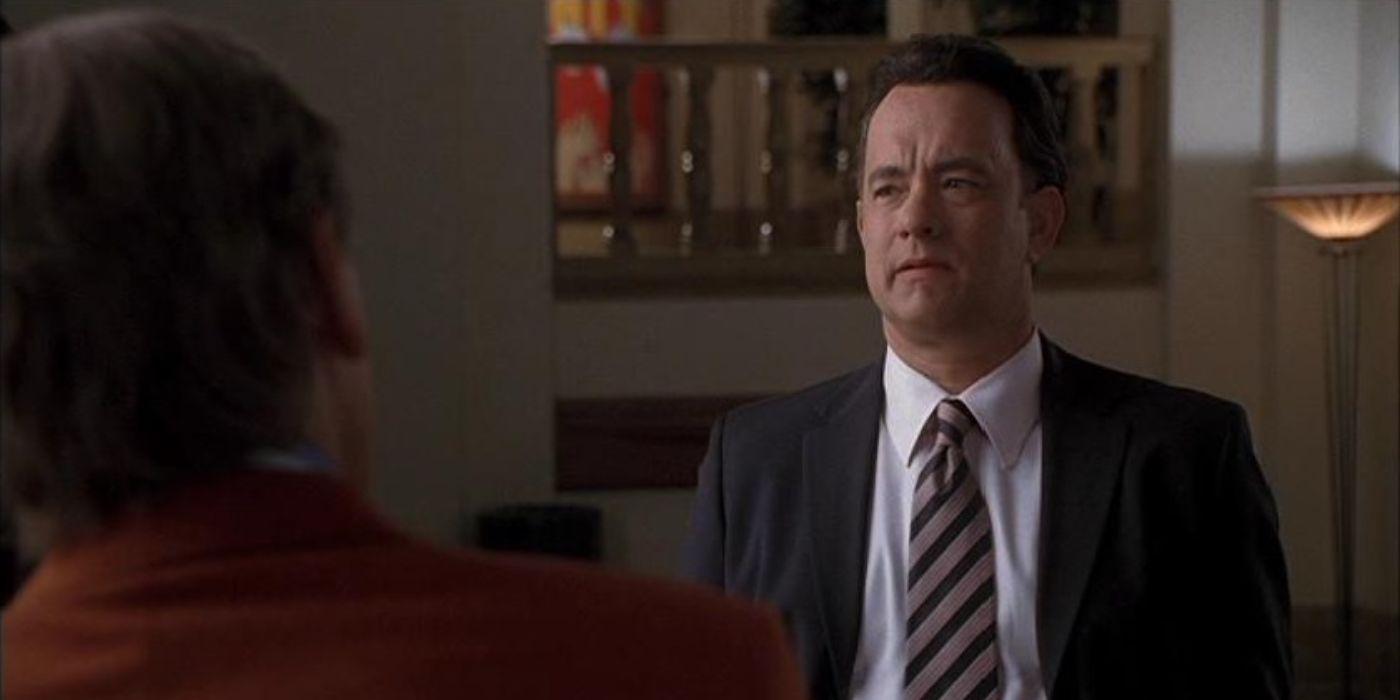 Tom Hanks as MR. Gable in A Suit and Tie Talking to Someone in the Great Buck Howard.