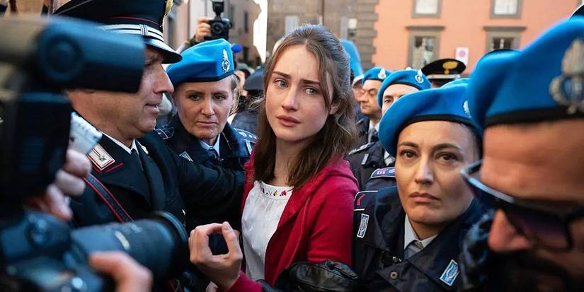 Amanda Knox tearful and surrounded by police