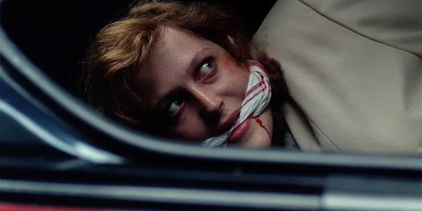 Dana Scully is tied up in the back of a car with a gag in her mouth in The X-Files "Ascension". 