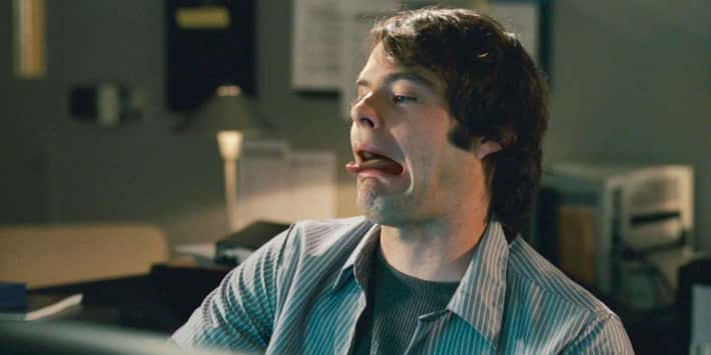 Bill Hader sticking his tongue out while working at a computer in Knocked Up