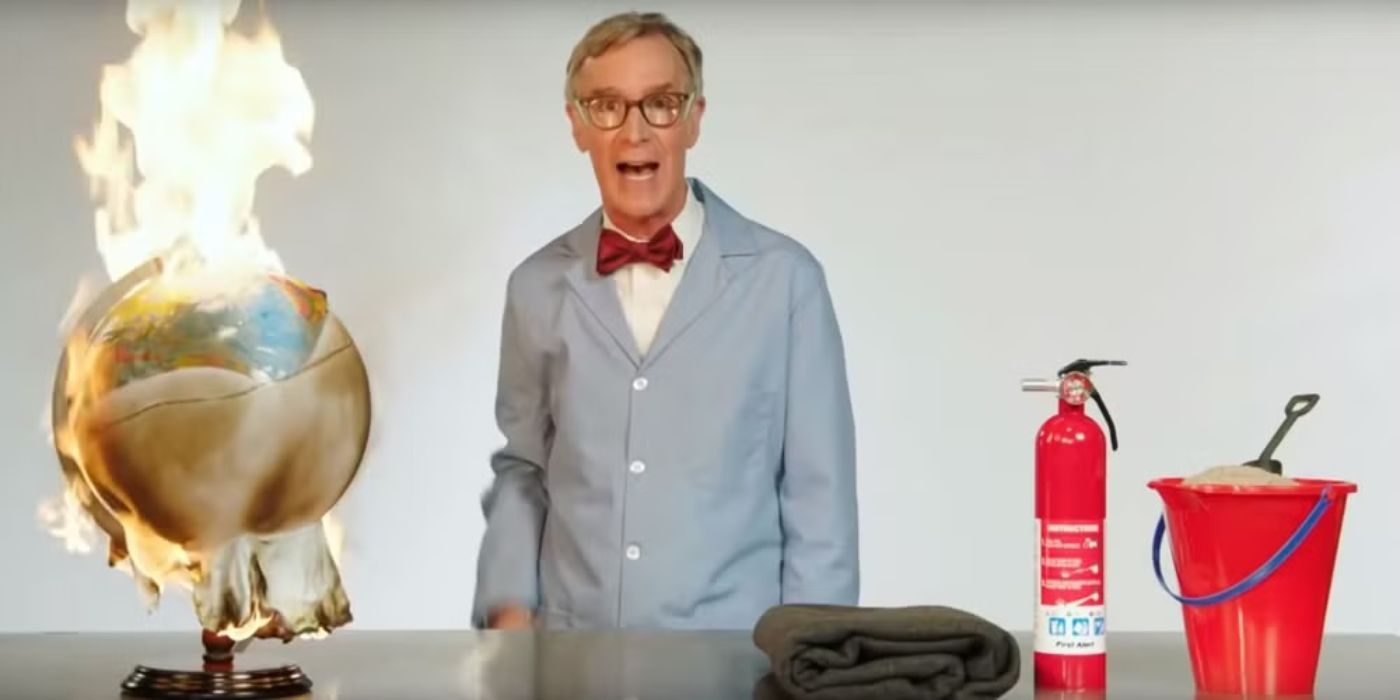 Bill Nye stands next to a flaming globe, talking about climate change on Last Week Tonight with John Oliver.