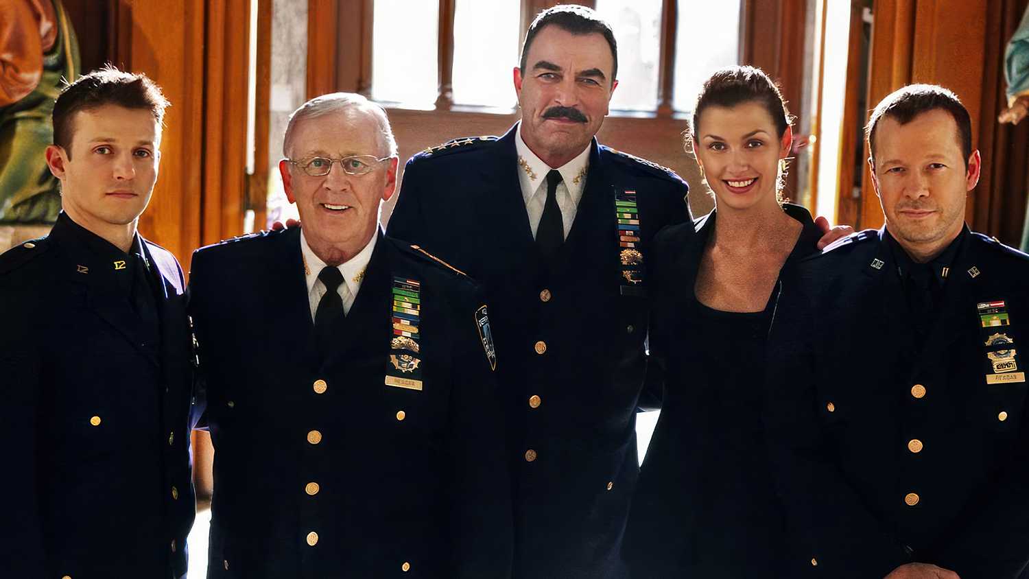 The cast of Blue Bloods lines up in uniform