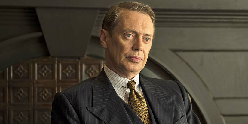 Steve Buscemi as Enoch "Nucky" Thompson in a suit and tie, sitting and staring ahead in Boardwalk Empire.