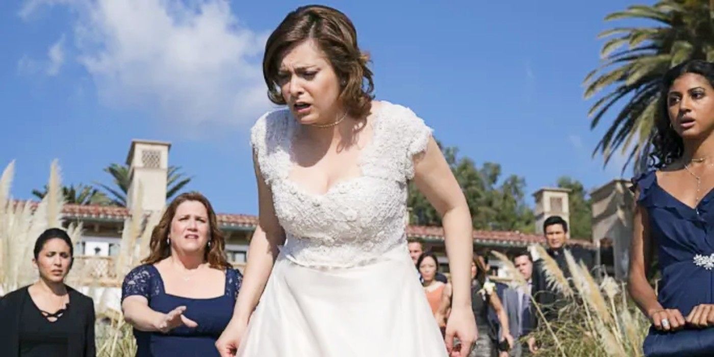 Rebecca is upset in a wedding dress with Valencia, Paula, and Heather nearby, Crazy Ex-Girlfriend Season 2