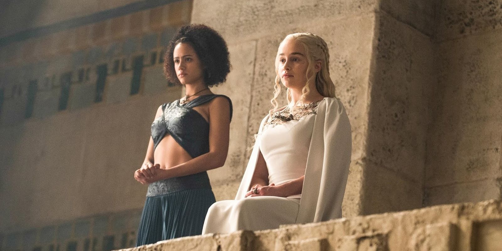 Missandei (Nathalie Emmanuel) standing beside Daenerys (Emilia Clarke) in Game of Thrones