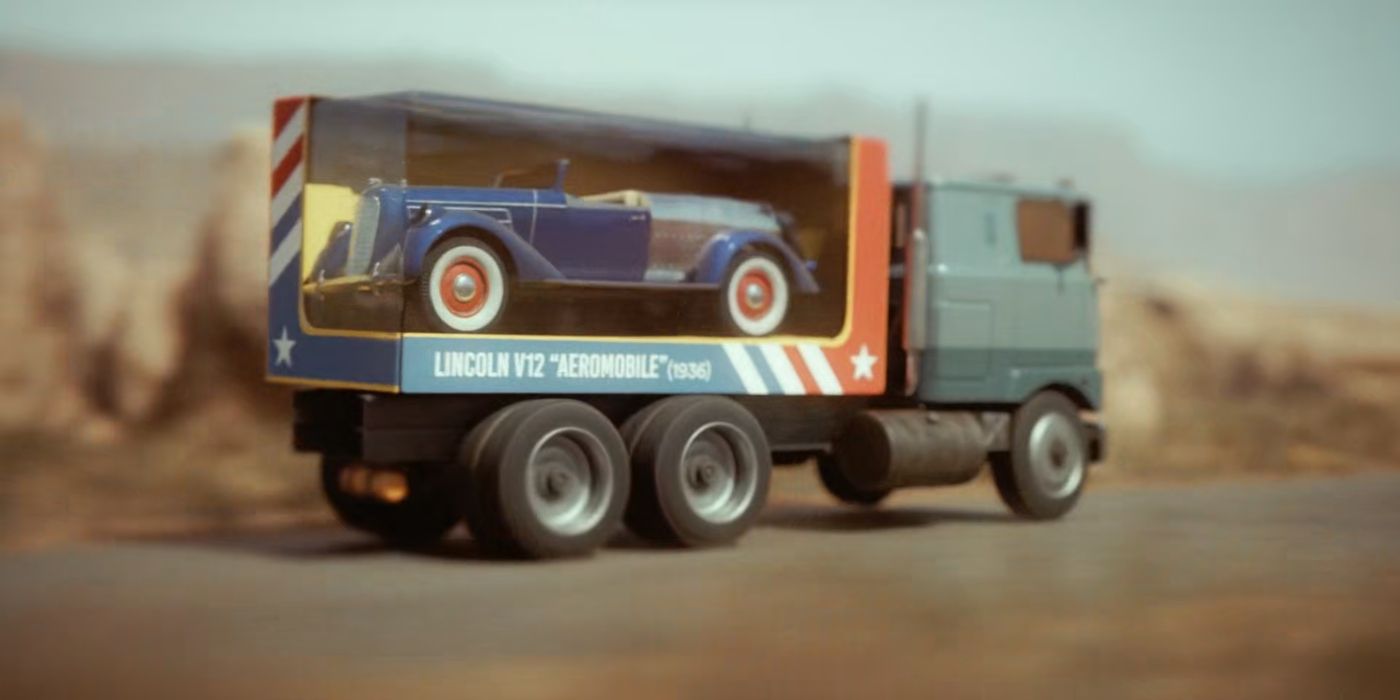 A truck carries a Lincold packed up like a toy in the opening credits of Duster